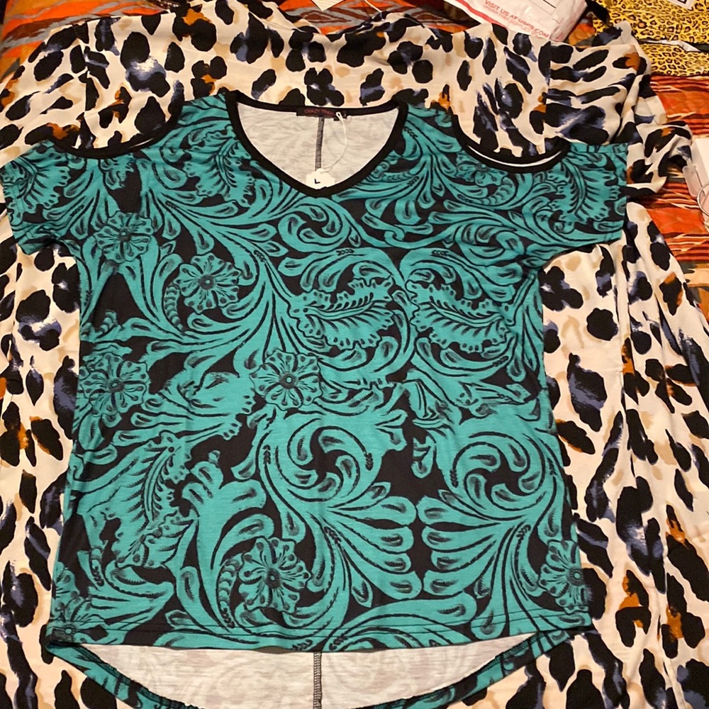 New with tag Crazy Train cold shoulder top.  Size L